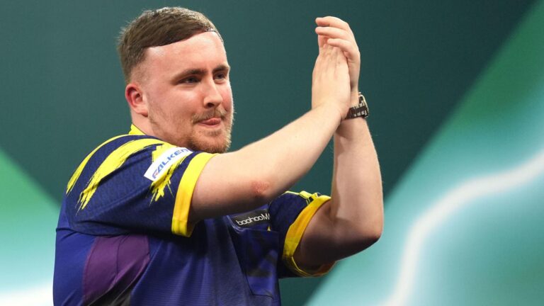 Luke Littler Advances to Round Two: Defending Champion’s Tense Opener at PDC World Darts Championship 2025/26