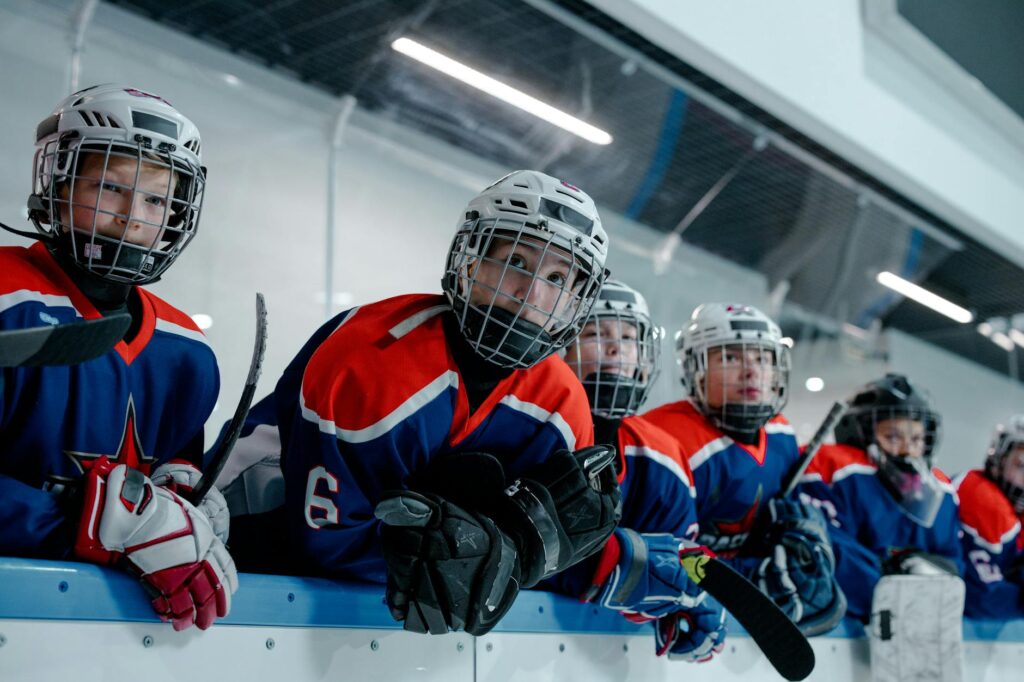 men in blue and red hockey uniforms